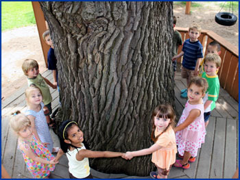 Children Surrounding Large Tree